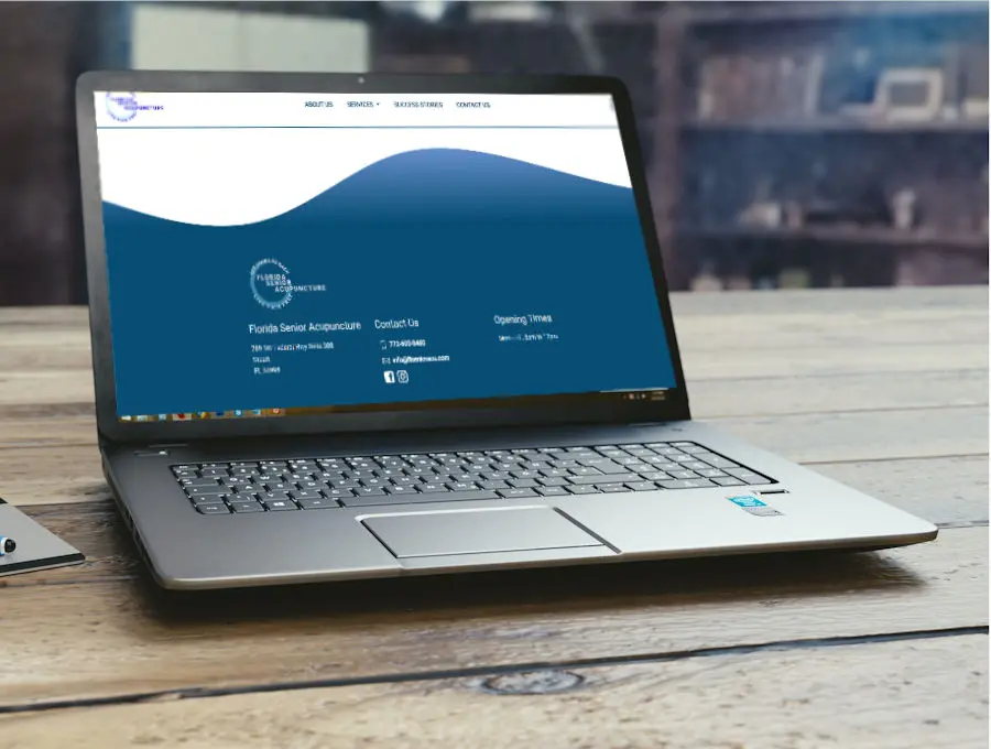 laptop showing contact details